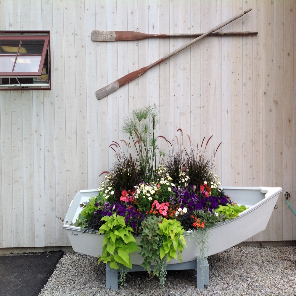 using flower pots in flower beds