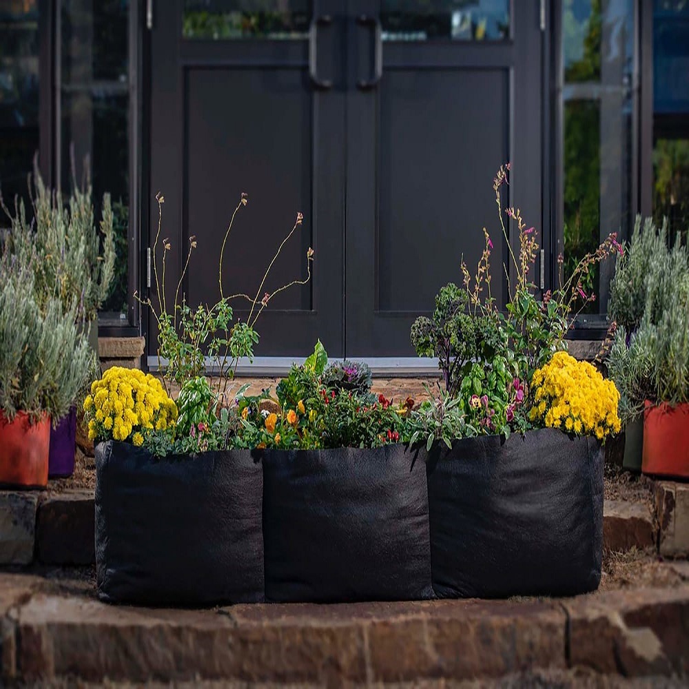 using flower pots in flower beds