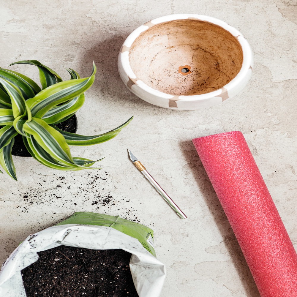 pool noodles in flower pots